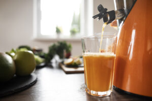 blended juice pouring in a glass