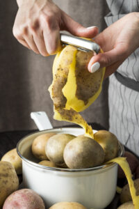 washing and peeling potatoes