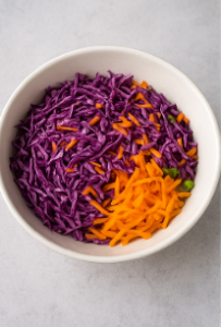 mixing all the vegetables and dressing